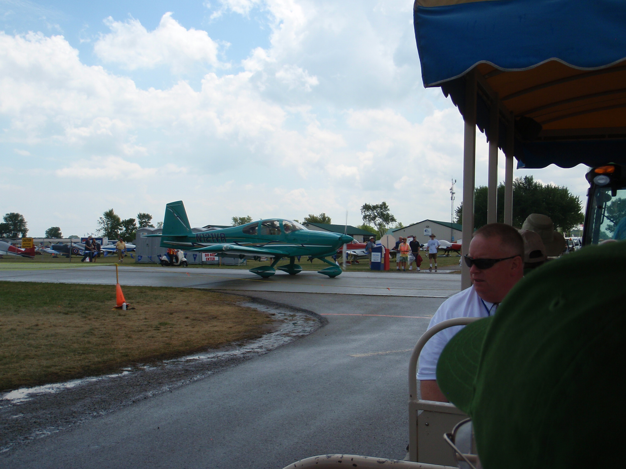 Riding the Red tram. We had to stop to give way and allow someone to taxi by at an intersection.