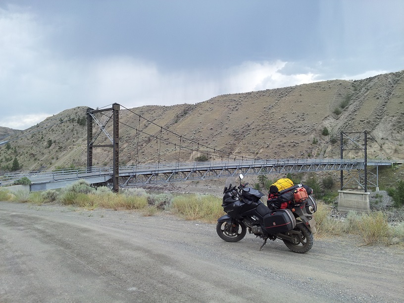 08 DL650 Vstrom.  Crossing the Fraser River just outside the Gang Ranch enroute Anahim Lake.